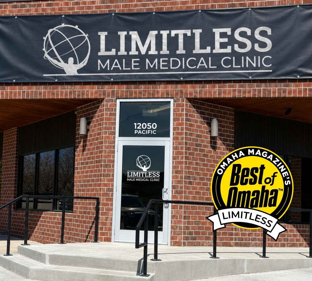 Front entrance of Limitless Male Medical Clinic on a brick building, with a large sign reading 'LIMITLESS MALE MEDICAL CLINIC' and a 'Best of Omaha' badge nearby.